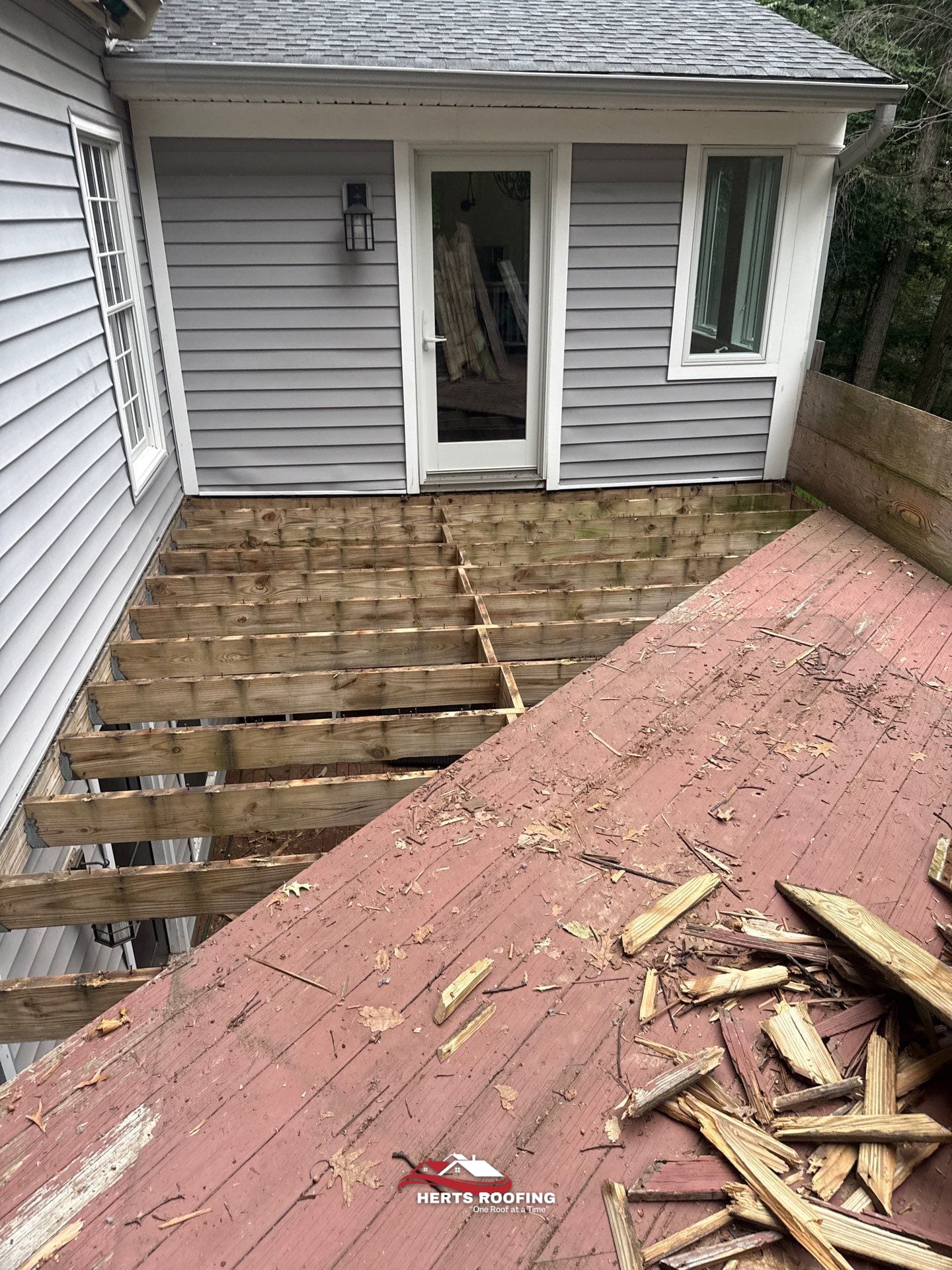 Deck Replacement: Decking, Stairs, and Aluminum Railing — during photo