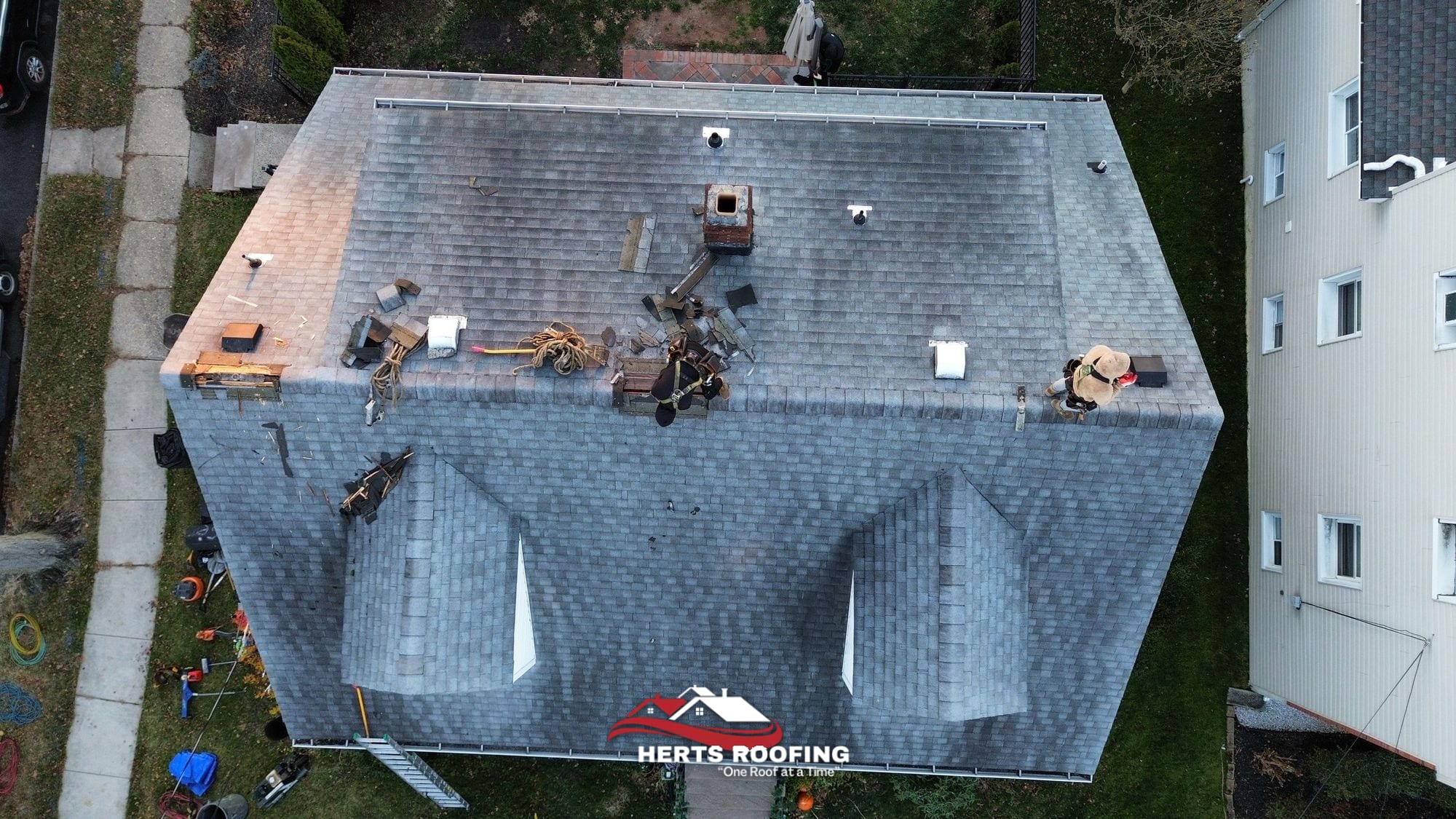 Roof Replacement by Herts Roofing & Construction — during photo